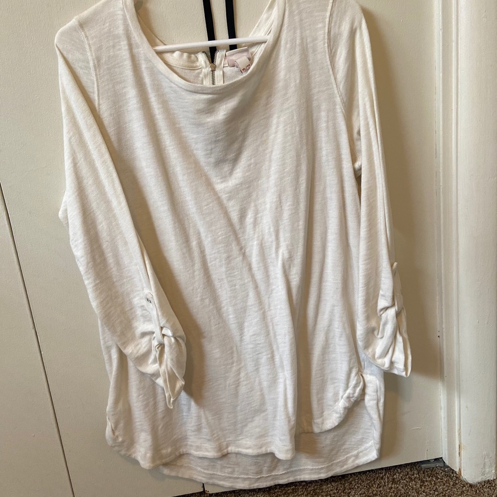 Quarter length sweater with zipper accent piece